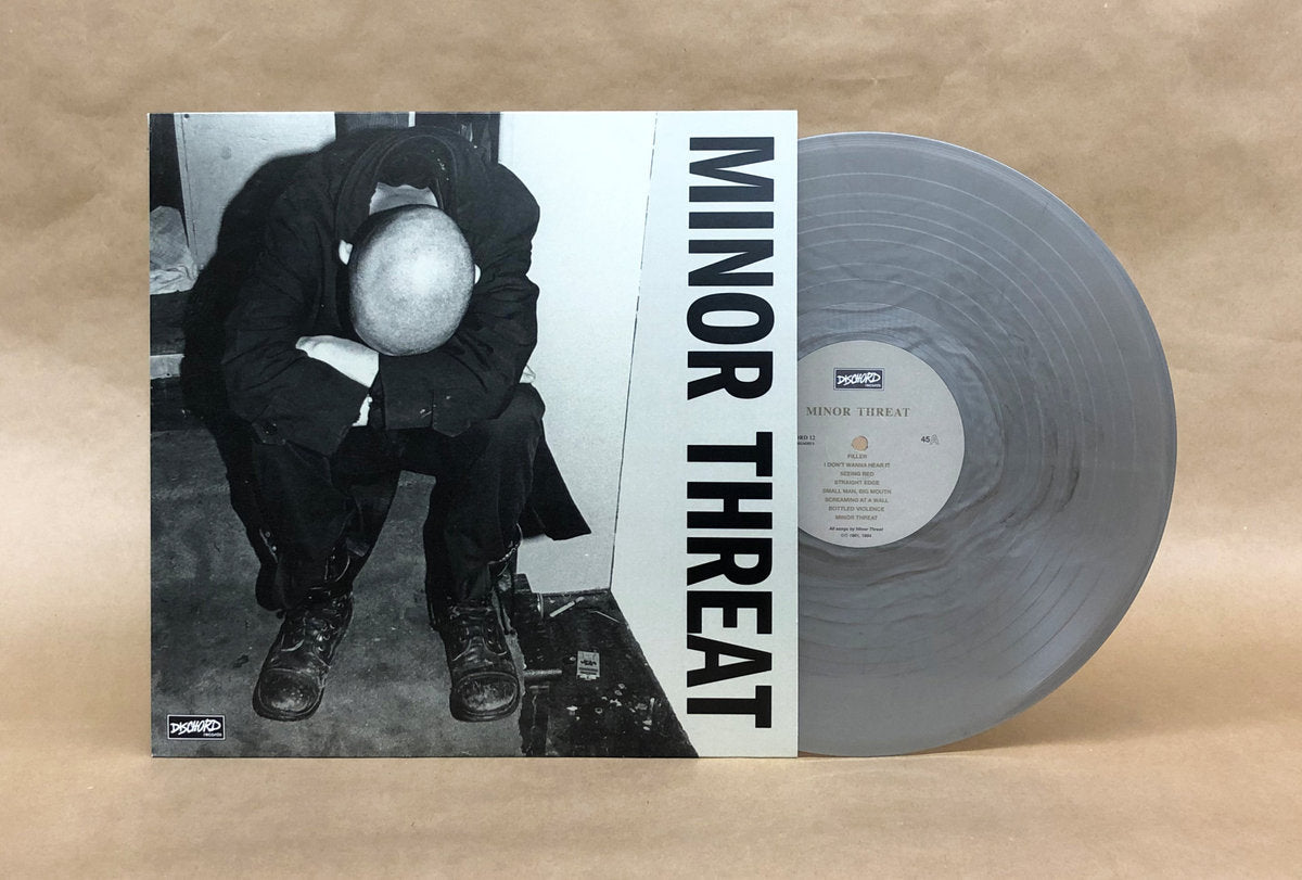 MINOR THREAT 'FIRST 2 7"s' (self titled) 12" EP - SILVER