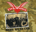 COCK SPARRER 'HERE WE STAND' LP (Clear w/ Black Splatter Vinyl)