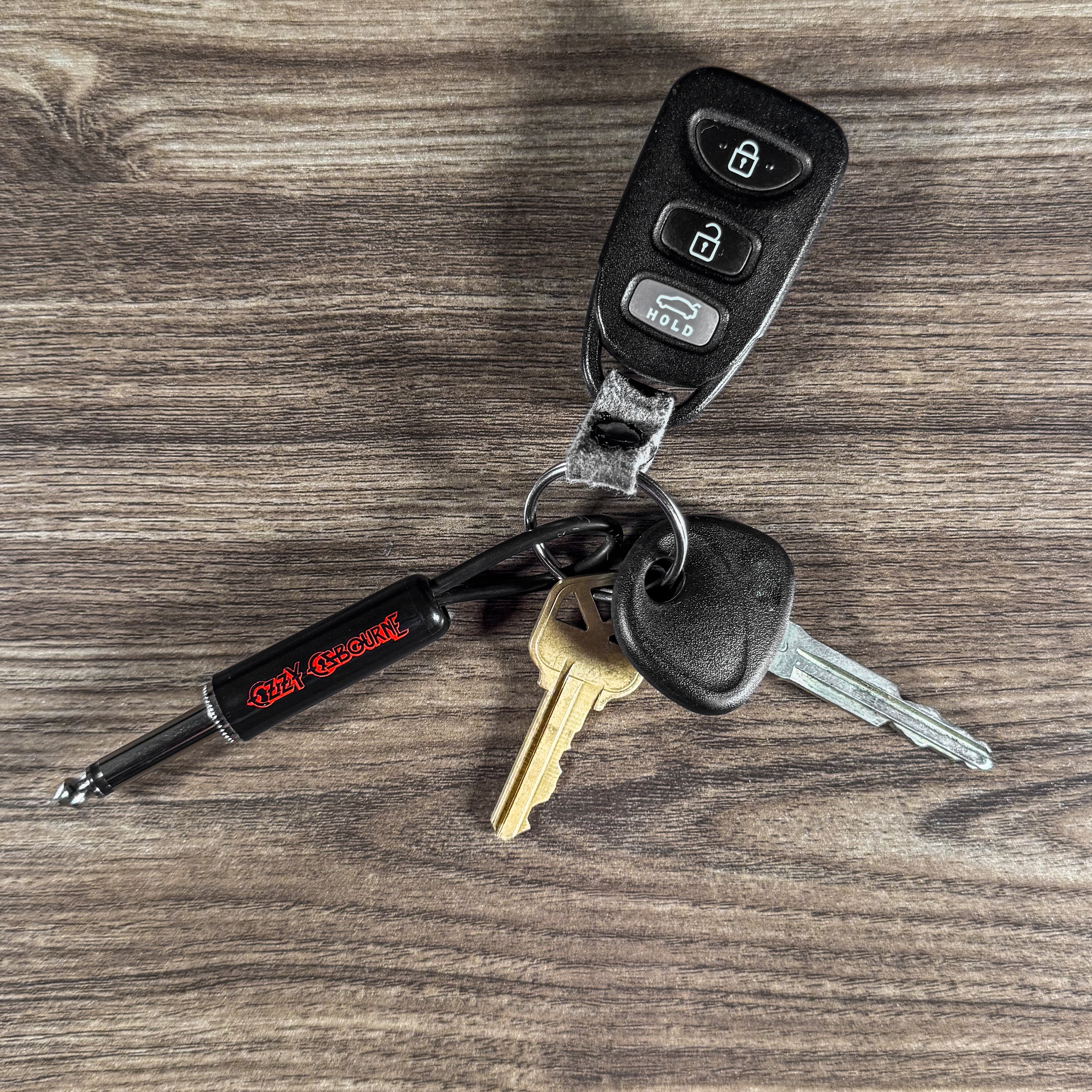 OZZY LOGO GUITAR PLUG KEYCHAIN