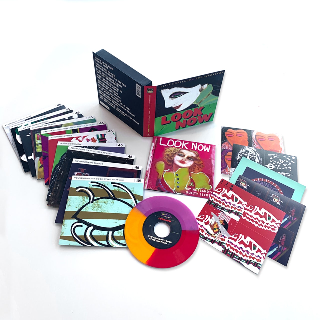 ELVIS COSTELLO & THE IMPOSTERS 'LOOK NOW' DELUXE BOX SET 7" - TRI-COLOR